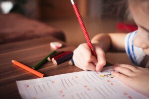 child writing emotions